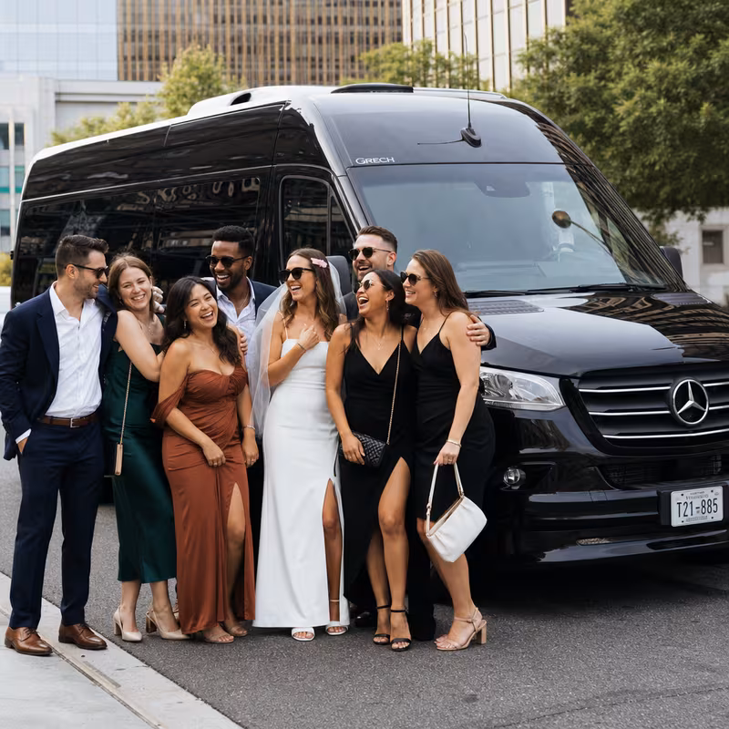 Group boarding a white charter bus for Bachelor & Bachelorette Transportation transportation in Washington