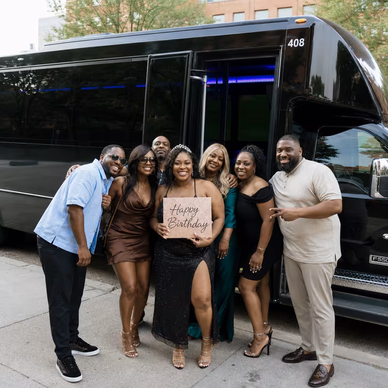 Party bus interior with wraparound leather seating and LED lighting in Washington