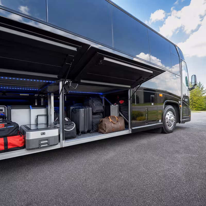 Party bus interior with wraparound leather seating and LED lighting in Washington